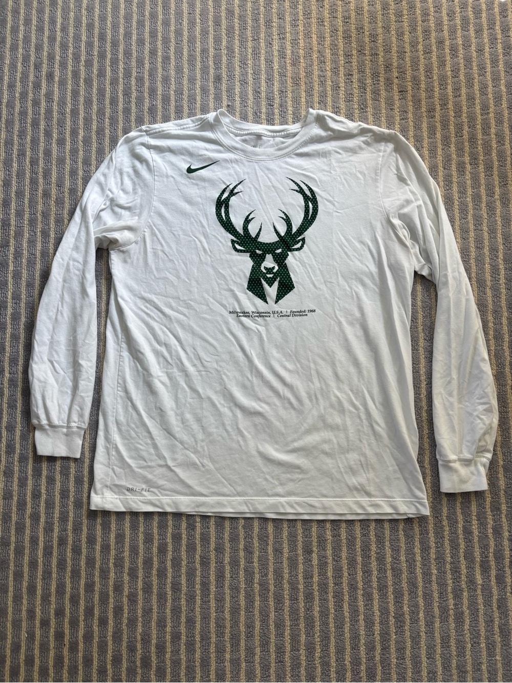 Nike Men’s White Long-Sleeve Shirt with Green Bucks Graphic